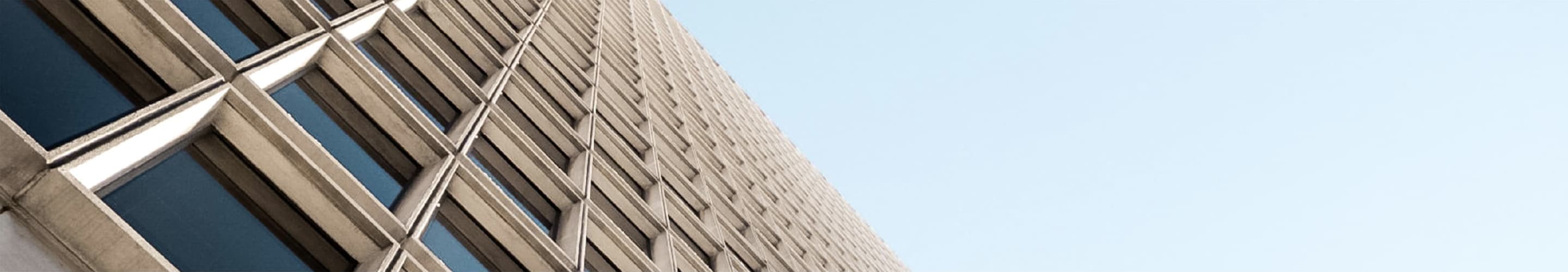 Looking up at the building facia at an angle.