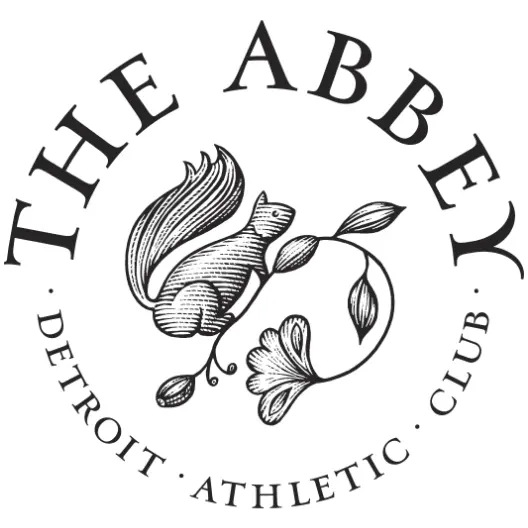 The Abbey brandmark with a squirrel emblem in the center with the wordmark around in a circle