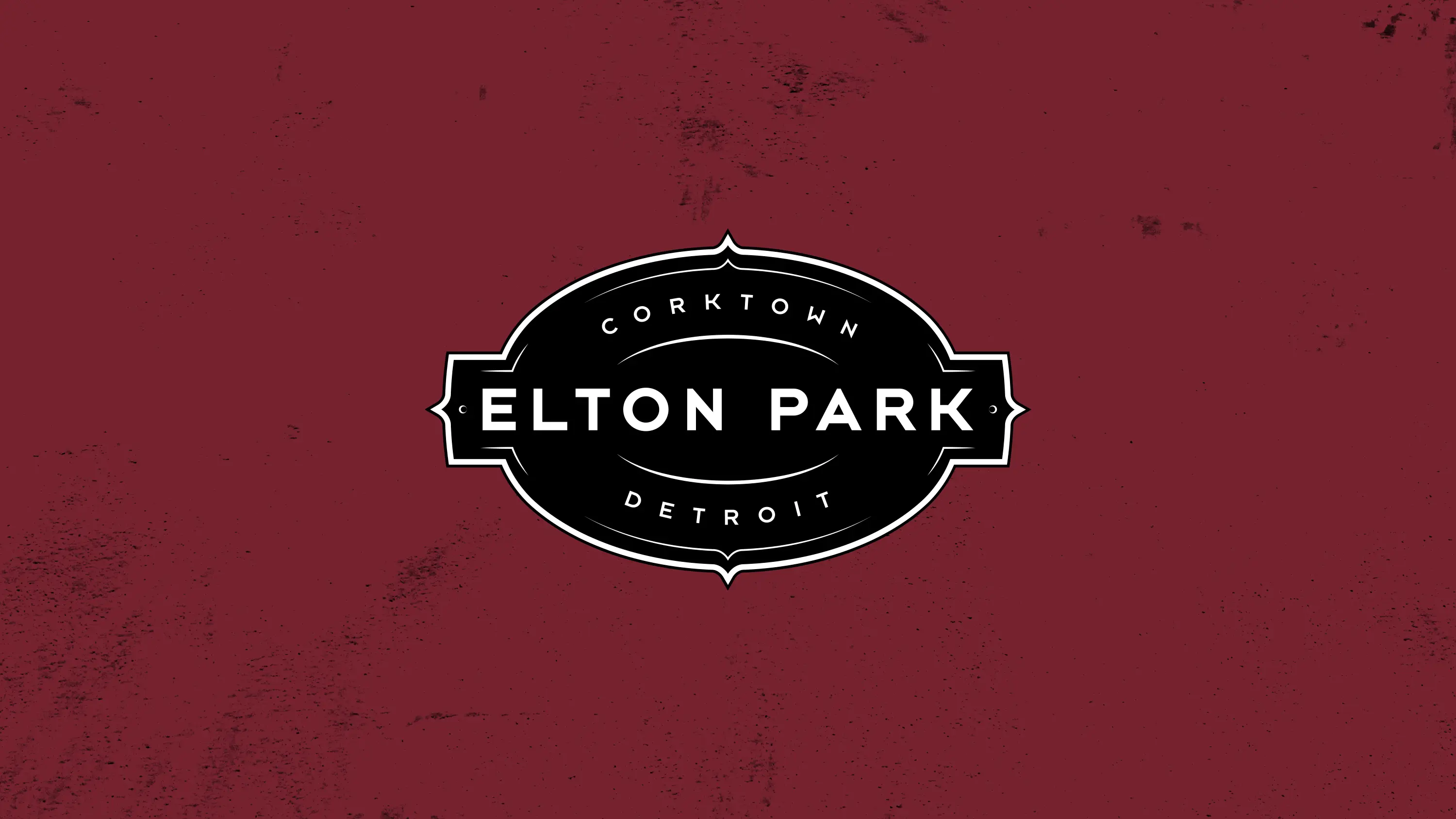 Elton Park logo against the signature red background texture