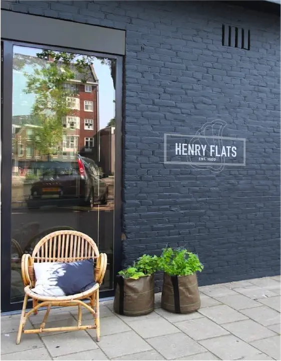 henry flats logo painted on the outer wall