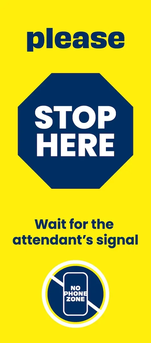 please stop here wait for the attendant's signal