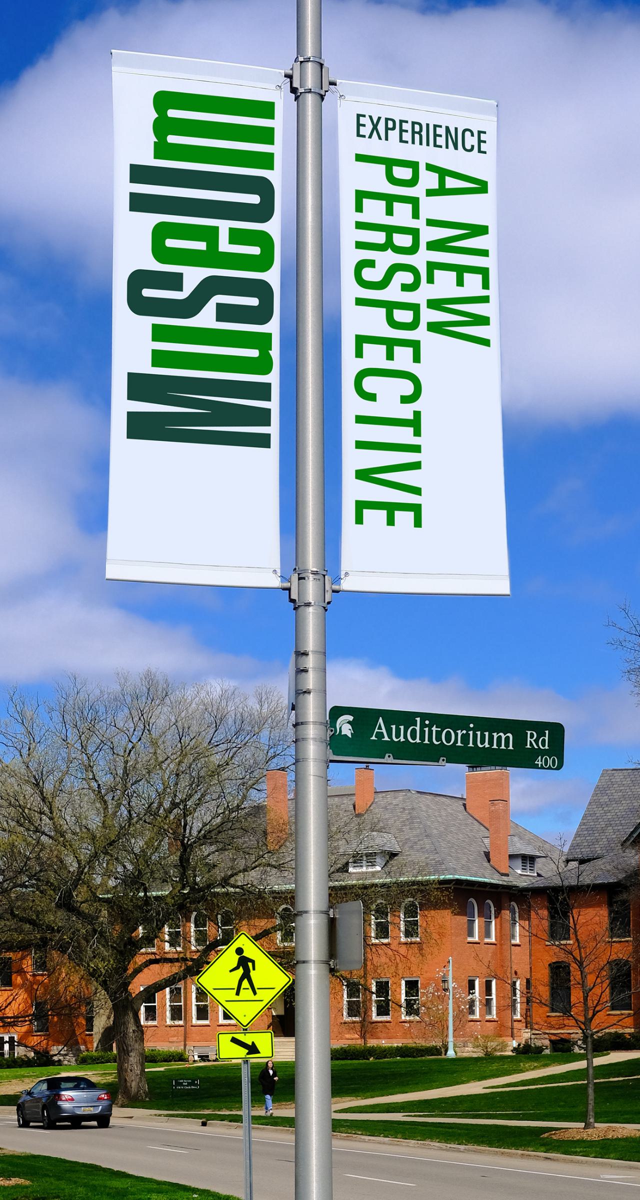 street banners with the new logo and verbal identity