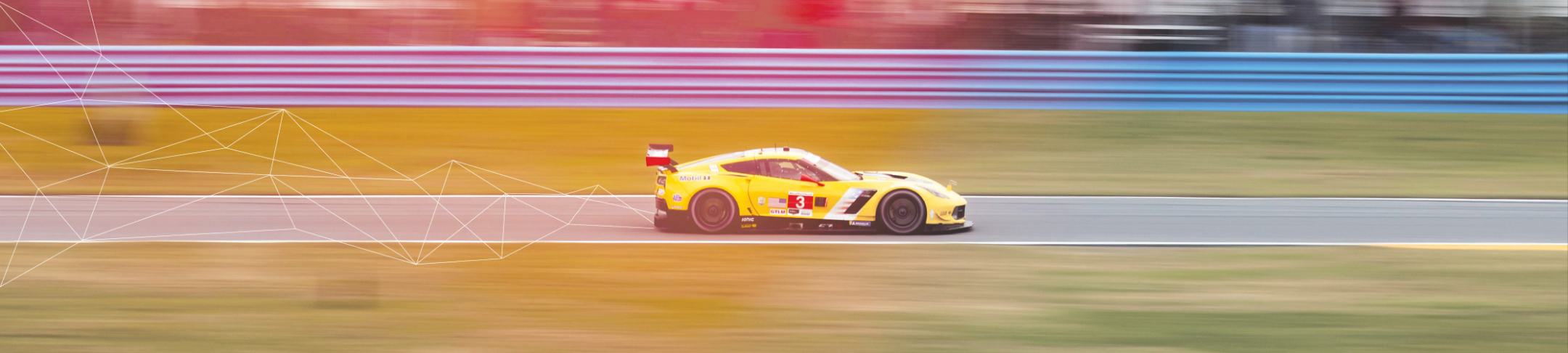 stylized car racing photograph
